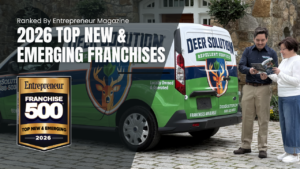 Promotional image for Entrepreneur's 2026 Top New & Emerging Franchises showing a branded van, a Franchise 500 badge, and two people reading a magazine.